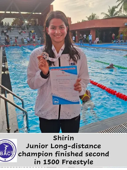 Shirin with her silver medal in the 1500m Freestyle.