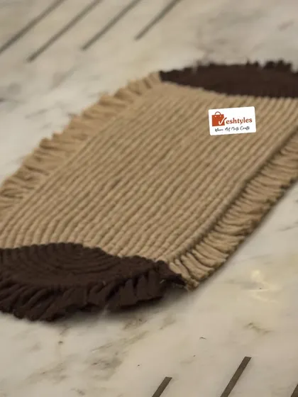 This handcrafted table mat is a great addition to your home furnishing collection. It's made with high-quality, durable materials.