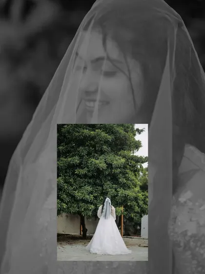A creative and artistic portrait of the bride. The overlay of her smiling face on a shot of her in a beautiful white gown creates a dreamy and emotional image.