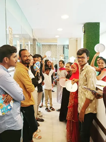 The excitement is visible as our students participate in a game. We believe that a playful atmosphere is key to effective language learning for children and adults alike.