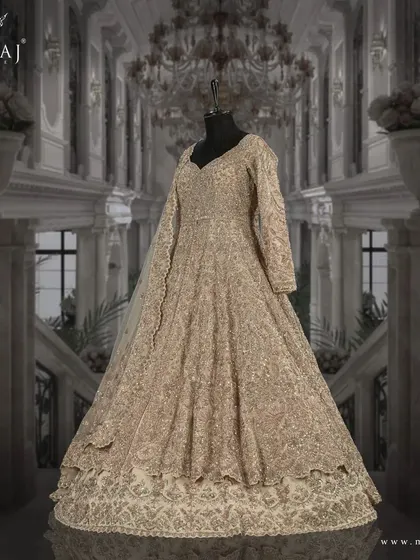 A studio shot of the light gold Indo-Western ensemble, embodying a rich yet subtle aesthetic perfect for any occasion.