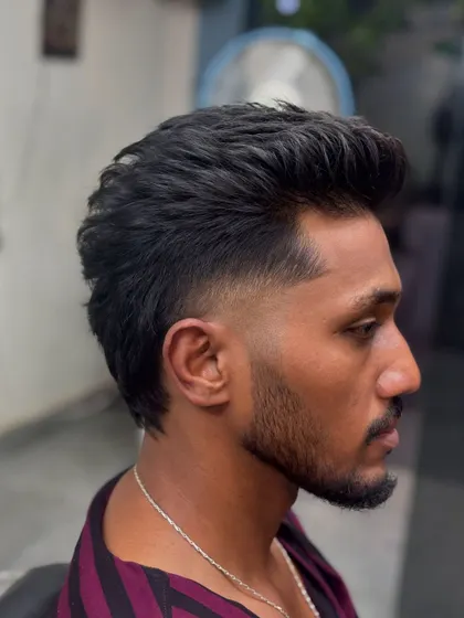 Another angle of the pompadour-mullet, showing the sharp fade.