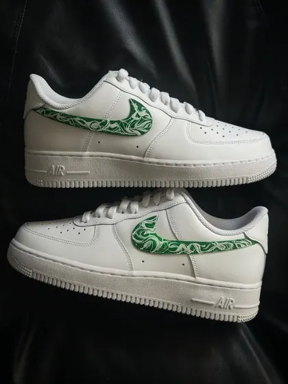 A pair shot of the green paisley custom sneakers.