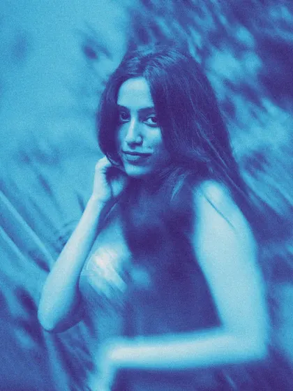 This is an example of my more creative and experimental editing style. The motion blur and cool blue tones create an abstract, moody, and aesthetic portrait.