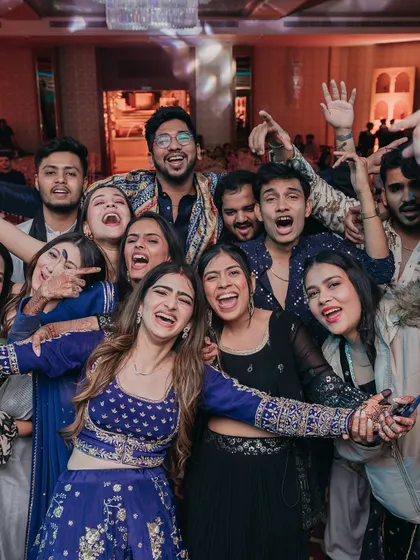 A candid shot of the bride and her friends enjoying the Sufi night. My goal is to create an environment where everyone feels free to let loose and celebrate.
