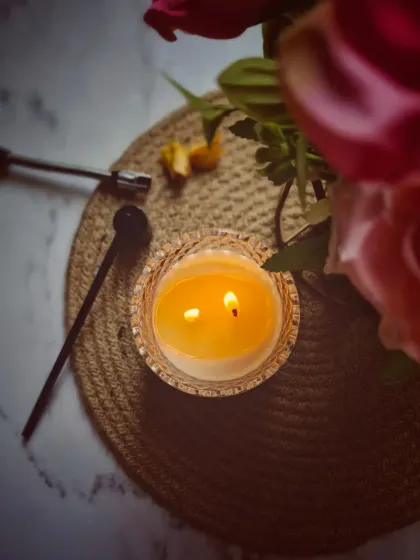 The warm glow of the dual wicks in my Crystal Jar Candle. This ensures an even wax pool, which provides the best possible fragrance throw to fill your room.