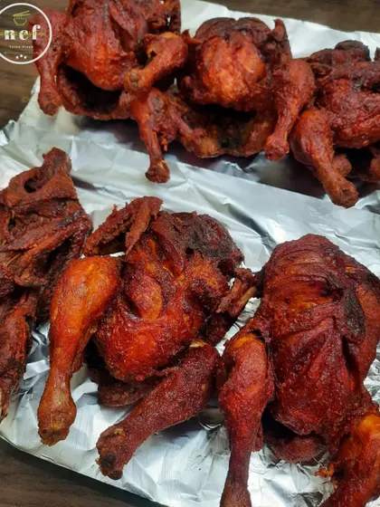 Another shot of my perfectly fried whole chickens, ready for a large order.