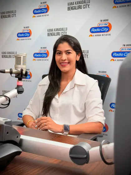 A professional portrait taken at the Radio City studio. I am comfortable and confident sharing my story and expertise on public platforms.