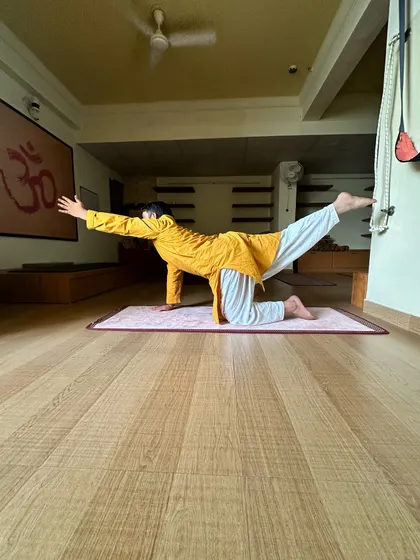 This balancing table-top pose strengthens the entire back of the body, improves balance, and promotes core stability.