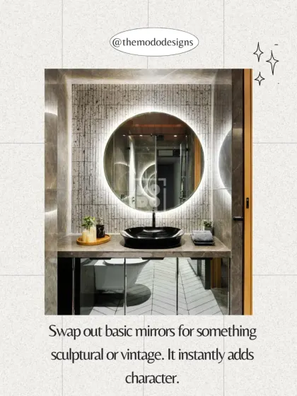 Swap out basic mirrors for something sculptural or vintage. A unique mirror, like this backlit round one, instantly adds character and becomes a focal point.