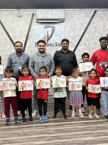 A proud moment for our young artists. Here are the winners and participants of the Kids Coloring Competition, holding up their certificates and showcasing their creative work.