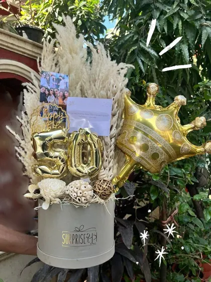 Another look at our popular 50th birthday bouquet, held up to show its size and intricate details.