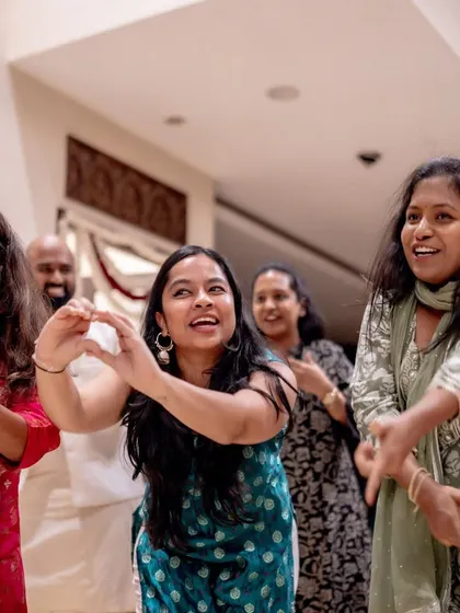 Guests show off their dance moves, adding to the vibrant and energetic atmosphere of the celebration.