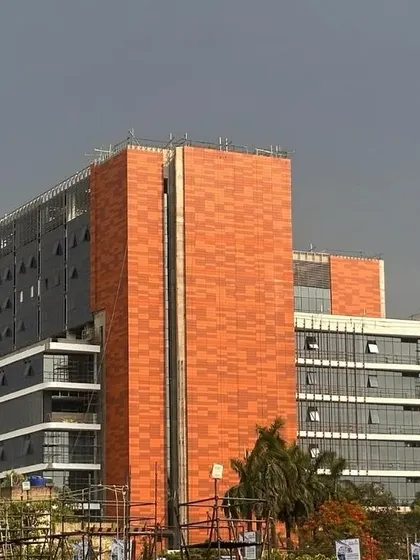 The nearly complete facade of Peerless Hospital defines its spatial identity. The interplay of glass, brick, and concrete reflects our commitment to creating a tangible, patient-centric built form.