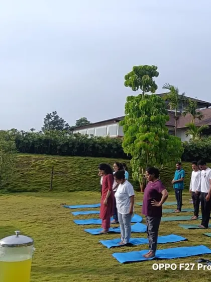 A group of guests being guided through a gentle warm-up sequence by our experienced yoga teacher. Every session begins with mindful movements to prepare the body and prevent injury.