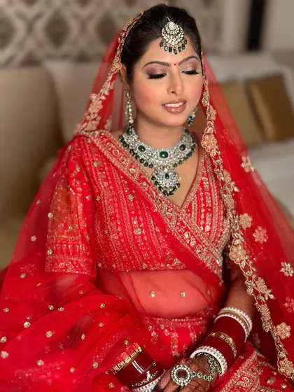 A moment of calm before the ceremony. This shot beautifully captures the soft shimmer on the eyes and the flawless finish of her #NOFILTERMAKEUP.