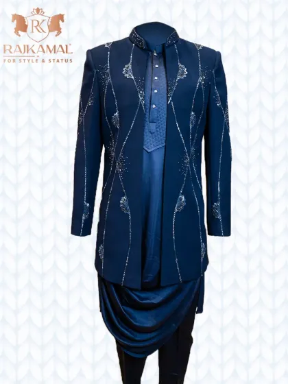 My open Indo-Western jacket paired with a cowl kurta. This navy blue ensemble features delicate silver beadwork, offering a look that is both royal and fashion-forward.