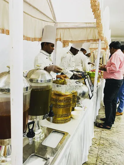 A simple yet elegant live counter setup for an indoor event. My professional chefs are ready to serve guests with a smile, ensuring a smooth and enjoyable food service.