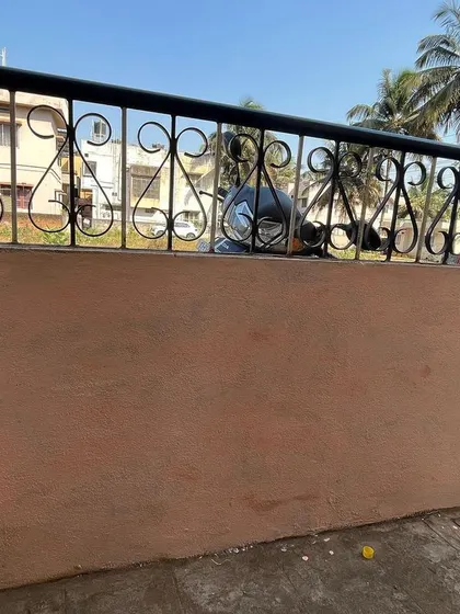 Every project starts with a blank canvas. This was the plain compound wall at my house before I began the process of transforming it with the custom lotus flower mural.
