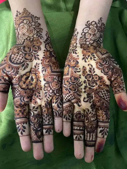 This design is filled with beautiful rose patterns and checkerboard fillers, creating a rich and textured look.