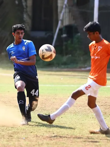 Two players challenge for an aerial ball during the MFA match. Physicality and timing are key aspects we work on.