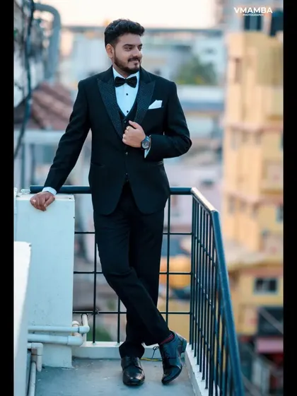 A duplicate of 15, a confident and stylish groom portrait.