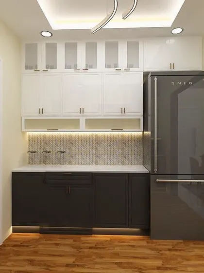 A simple home decor design showcasing a utility kitchen area with an integrated refrigerator.