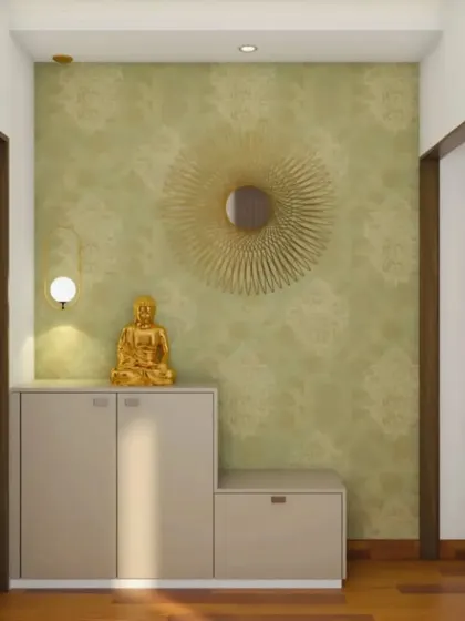 This compact shoe cabinet and bench combination is ideal for smaller entryways. The golden Buddha statue and sunburst mirror add a touch of warmth and spirituality to the space.