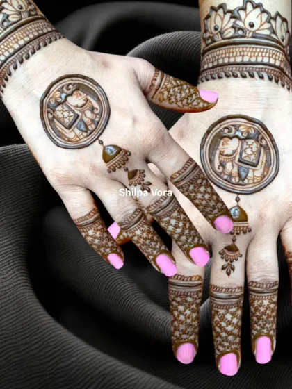 The same elephant and 'jhumka' design against a dark background, highlighting the intricate details.