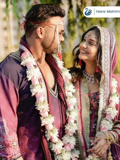 A loving glance between a newly married couple. These are the successful connections that drive my work and commitment to genuine matchmaking.