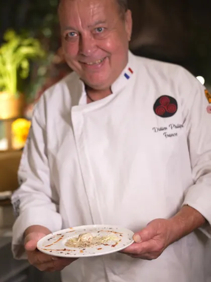 Chef Didier Philippe from France, another of our international masters, proudly displays his creation. Our global team of chefs is our greatest asset, bringing authentic and innovative flavours to your event.