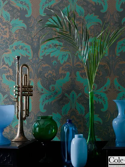 A classic damask pattern from Cole & Son, reimagined in a contemporary palette of teal and bronze. This wallpaper demonstrates how historical motifs can be infused with modern energy, creating a look that is both timeless and refreshingly current.