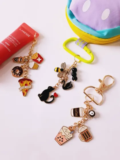 What's your mood today? This collection of custom enamel charm keychains has something for everyone, whether you're a coffee addict, a boba lover, or a foodie.