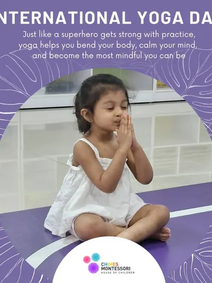 On International Yoga Day, a child sits in a prayer pose, demonstrating the calm and focus that yoga brings to our young learners.