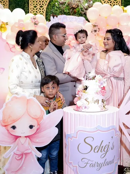 Capturing the whole family at a first birthday party. We also offer event photography to document your special celebrations with all your loved ones.