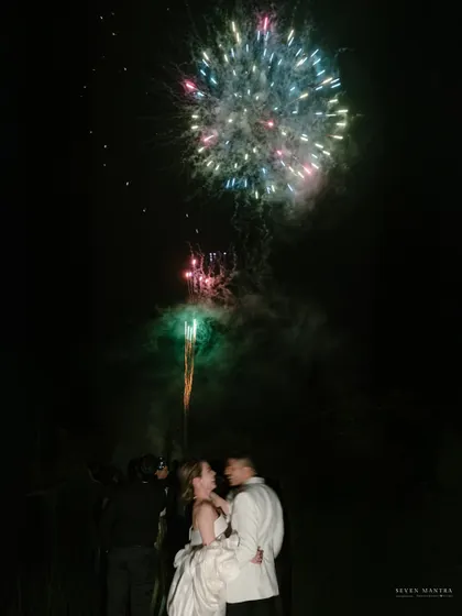 A quiet moment together watching the fireworks. Even amidst the grandest celebrations, I look for the intimate connections.