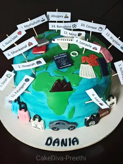 A one-of-a-kind globe cake for a travel lover's 30th birthday. It's decorated with flags marking all the places she's visited and miniature fondant luggage, a passport, and an airplane.