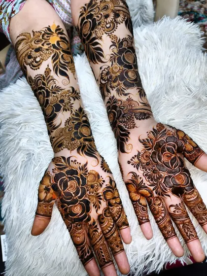 This design features bold, shaded roses as the central element, creating a dramatic and beautiful effect.
