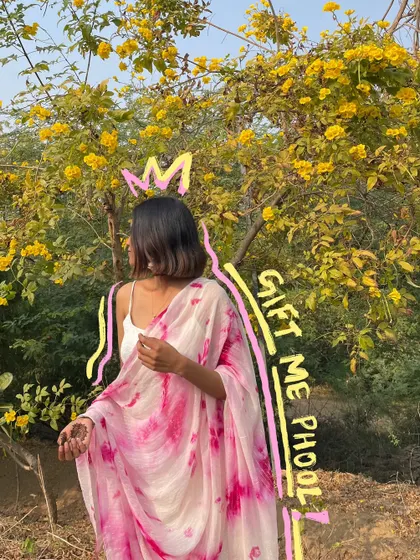 Gift me phool (flowers). A fun text doodle on this photo of me in a tie-dye saree among yellow flowers.