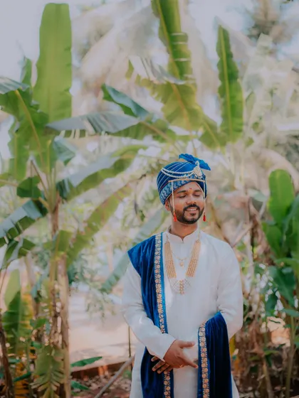 A calm and composed portrait of the groom on his wedding day.