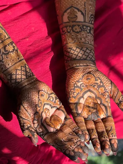 Both hands together, presenting a complete and beautiful story of the couple, ready for their wedding day.