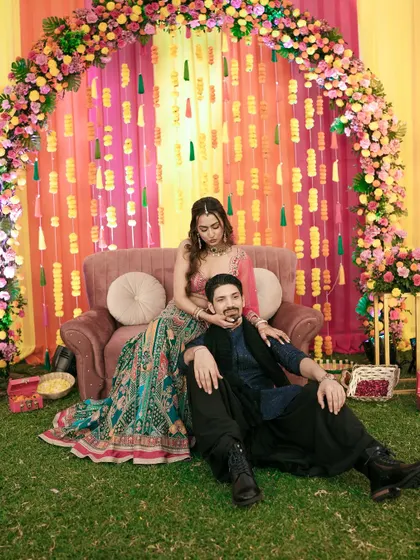 A playful and affectionate moment captured between the couple during their Sangeet celebration.