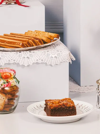 A simple yet elegant Diwali gift set, with a fudgy brownie, a jar of biscotti, and our signature caramel cigars.
