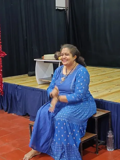 A candid moment of laughter during a story. It's these spontaneous reactions that make each session unique and memorable.