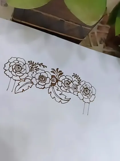 The floral garland element that is used to decorate the swing in the baby shower design.