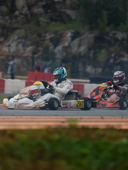 A three-kart battle in the IAME Series Asia, where our driver showcased stellar performance, moving up from P27 to P13.