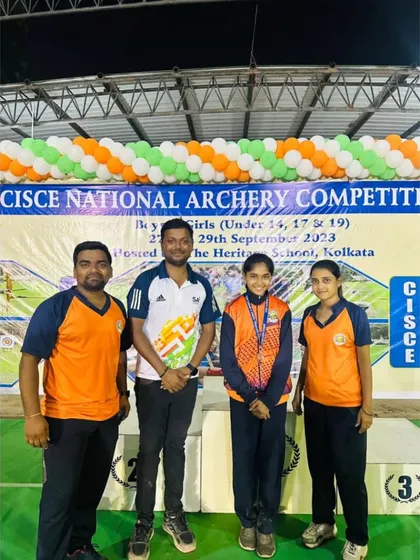 Posing with one of our national silver medalists. This student secured 2nd place at the CICSE National Archery Competition in Kolkata, a fantastic result of her hard work.