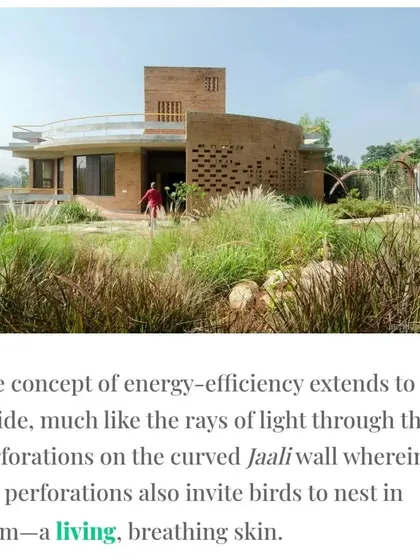 The "Breathe" residence, an award-winning earth house, is defined by its curved jaali wall. This feature is not just aesthetic; it provides natural ventilation and invites birds to nest, creating a living, breathing skin for the building.