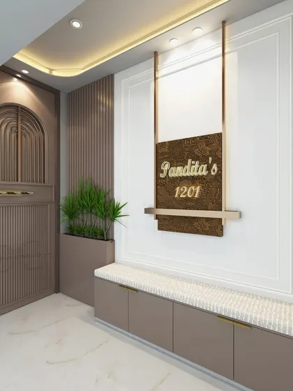 A closer look at the personalized nameplate and entrance seating. The combination of different textures like fluted panels, a cushioned bench, and a metallic nameplate adds depth and sophistication.