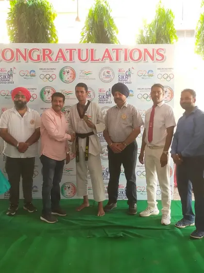 A proud moment with one of our black belt champions at the National Sikh Games.
